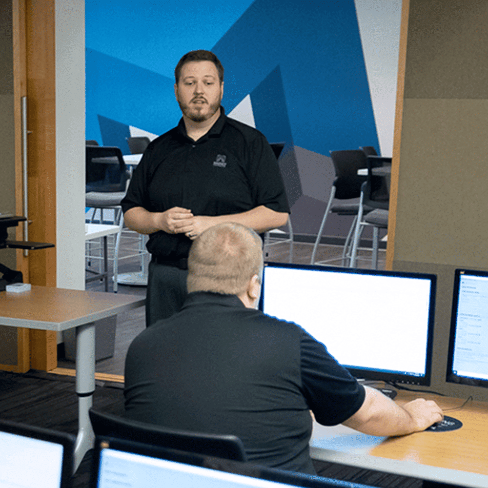 Chris Vance teaching in classroom